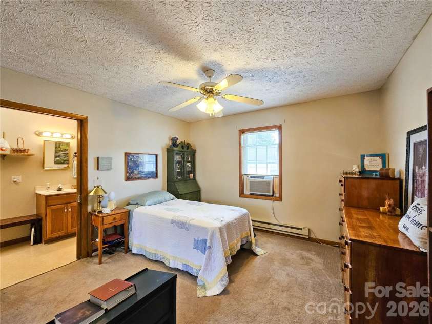 68 Strollers Lane, Waynesville, NC 28786.  MLS# CAR4394372, YatesRealty ID 31907. Primary Bedroom