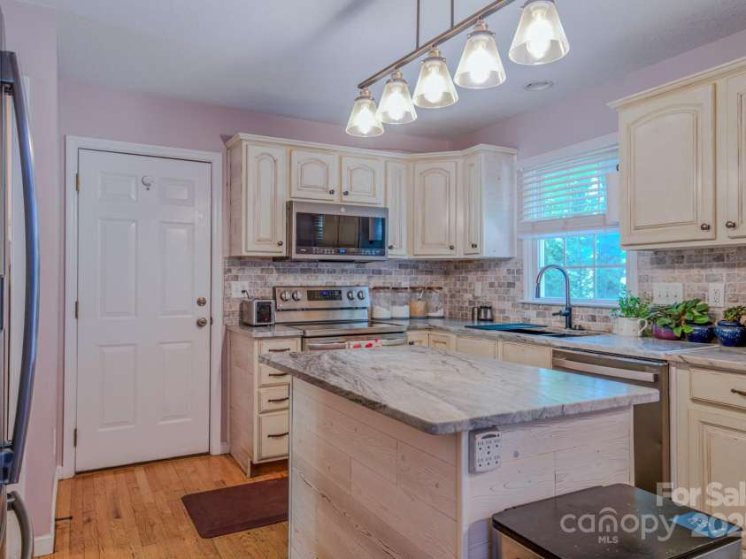 303 Theron Court, Candler, NC 28715.  MLS# CAR4291803, YatesRealty ID 31908. 