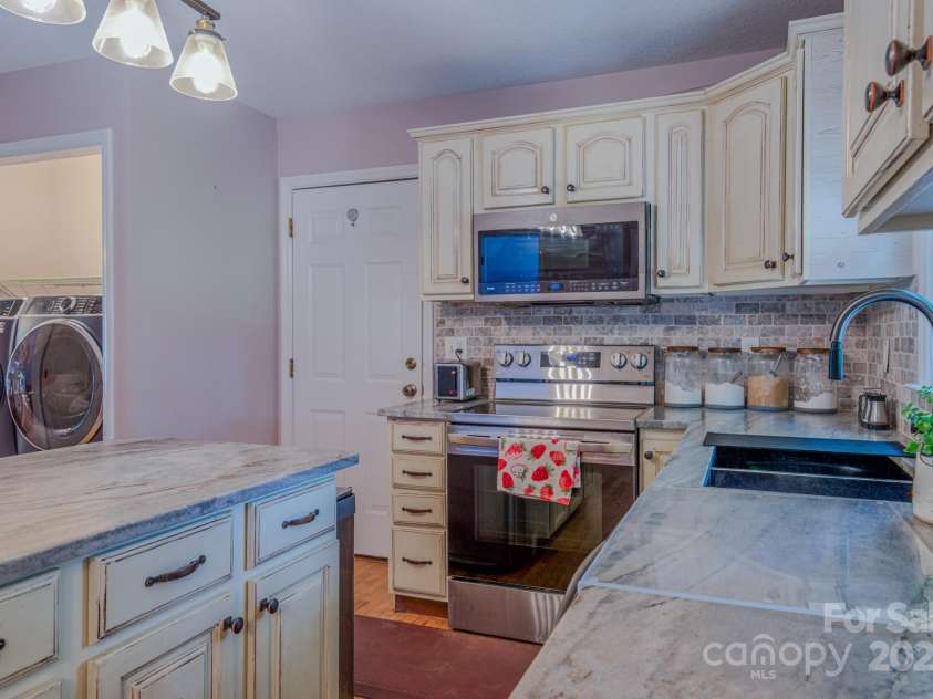 303 Theron Court, Candler, NC 28715.  MLS# CAR4291803, YatesRealty ID 31908. 