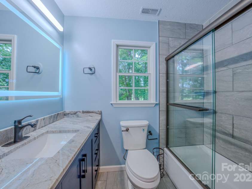 303 Theron Court, Candler, NC 28715.  MLS# CAR4291803, YatesRealty ID 31908. 