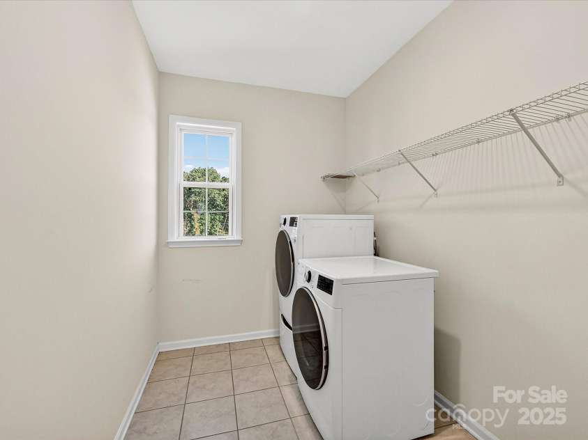 244 Bouchard Drive, Waxhaw, NC 28173.  MLS# CAR4312456, YatesRealty ID 3191. Second floor laundry 