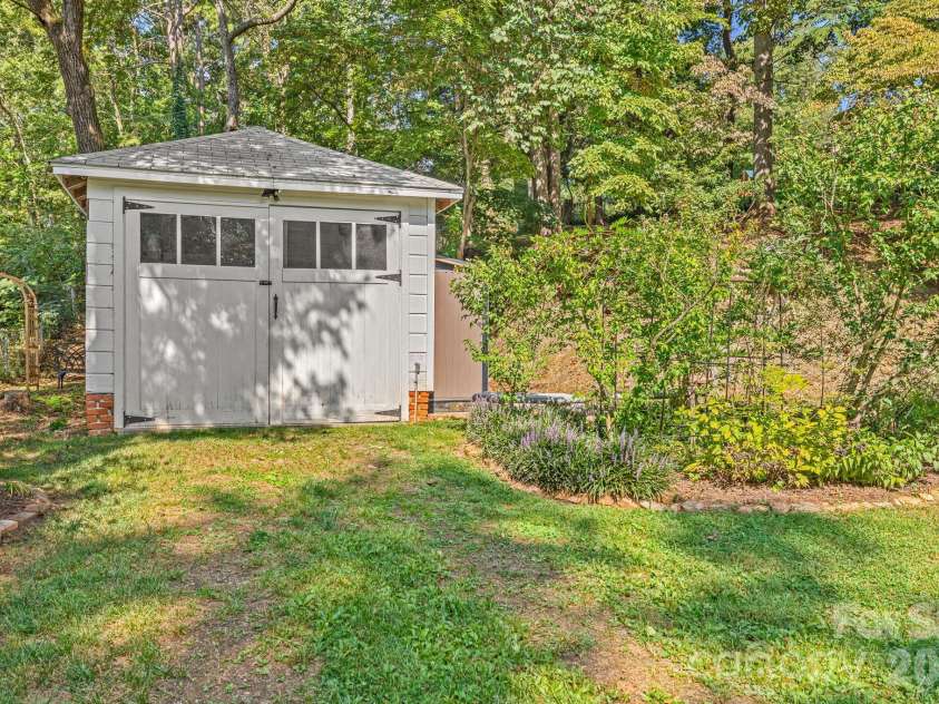 18 Robinwood Avenue, Asheville, NC 28806.  MLS# CAR4393836, YatesRealty ID 31910. Finished inside so could be workshop, office or craft studio (just needs a mini-split for year round use!)
