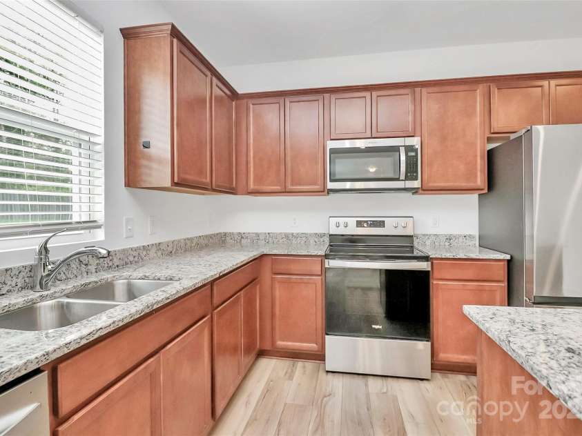 7013 Gale Force Lane, Charlotte, NC 28216.  MLS# CAR4291517, YatesRealty ID 31919. 