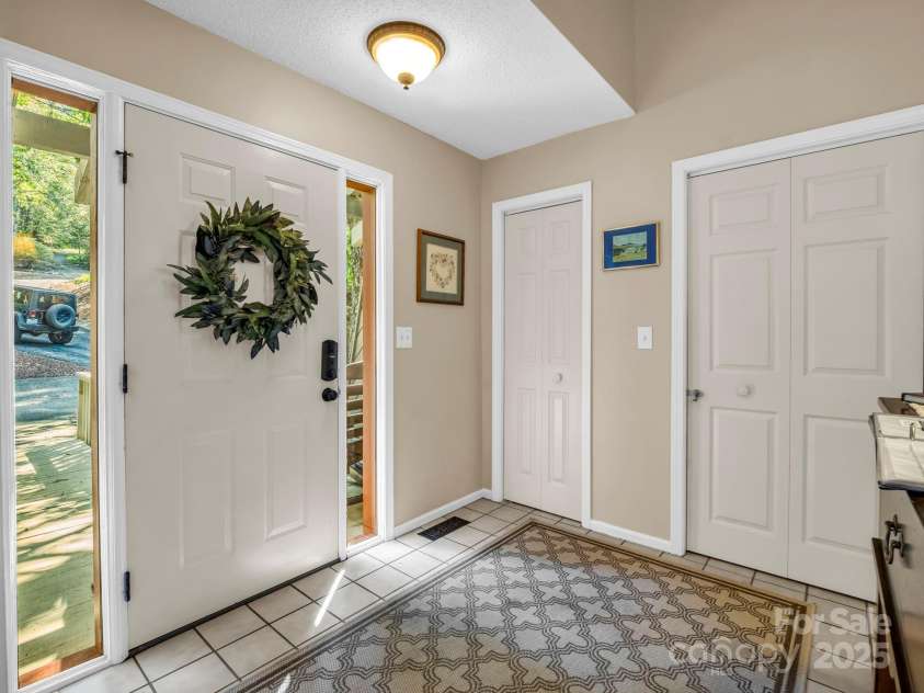 123 Mountain Village Boulevard, Lake Lure, NC 28746.  MLS# CAR4303567, YatesRealty ID 3192. Entry vestibule