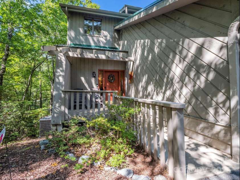 123 Mountain Village Boulevard, Lake Lure, NC 28746.  MLS# CAR4303567, YatesRealty ID 3192. Front Entrance