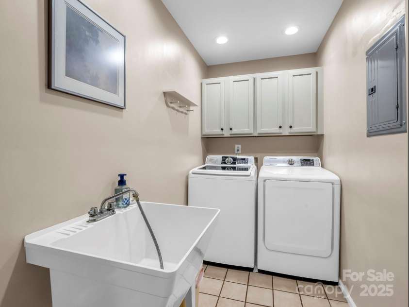 123 Mountain Village Boulevard, Lake Lure, NC 28746.  MLS# CAR4303567, YatesRealty ID 3192. Laundry