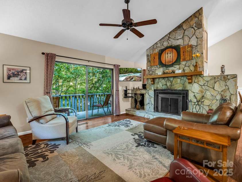 123 Mountain Village Boulevard, Lake Lure, NC 28746.  MLS# CAR4303567, YatesRealty ID 3192. LR from Den