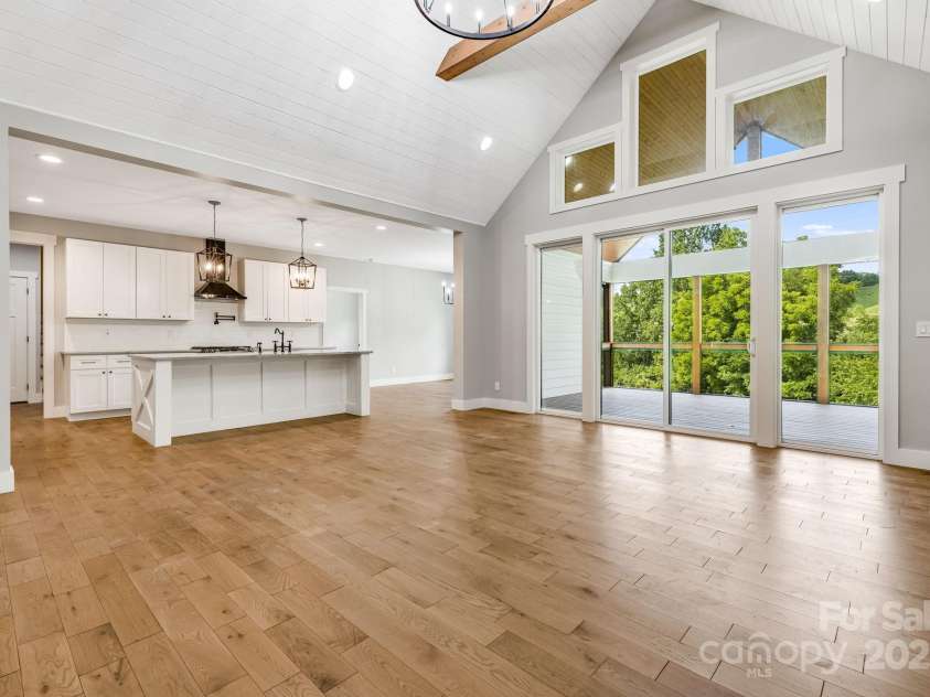 111 Oak Mountain Drive, Leicester, NC 28748.  MLS# CAR4289425, YatesRealty ID 31920. Beautiful views out all the large windows