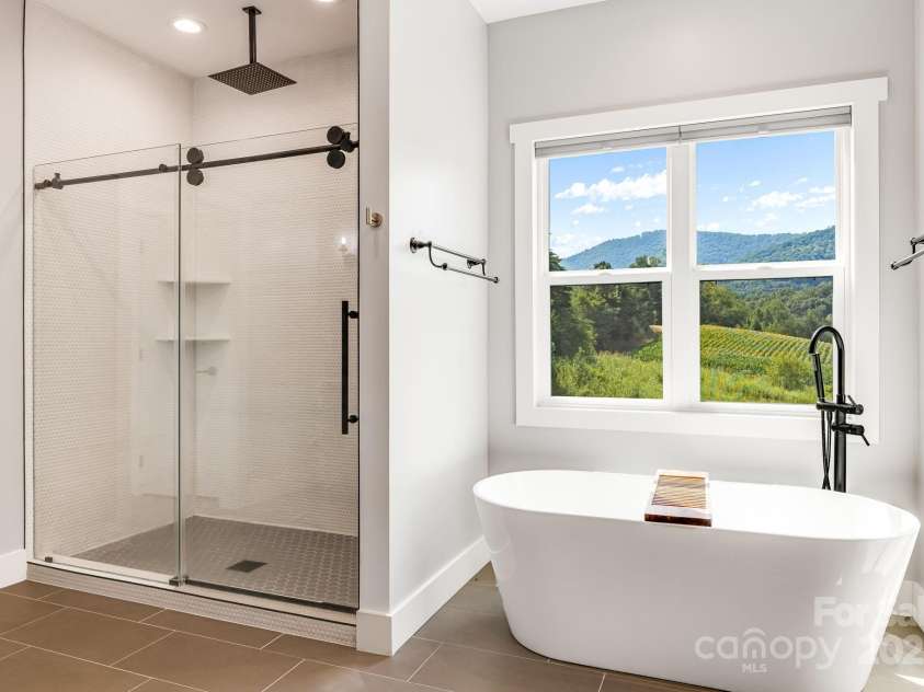 111 Oak Mountain Drive, Leicester, NC 28748.  MLS# CAR4289425, YatesRealty ID 31920. Not a bad view from the tub!