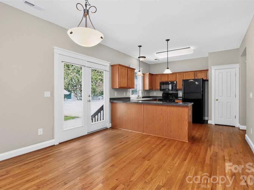13019 West Douglas Park Drive, Huntersville, NC 28078.  MLS# CAR4395919, YatesRealty ID 31922. Dining Rm and Kitchen