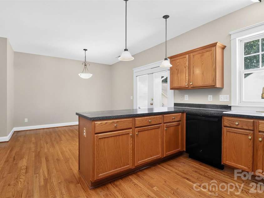 13019 West Douglas Park Drive, Huntersville, NC 28078.  MLS# CAR4395919, YatesRealty ID 31922. Kitchen and Dining Rm