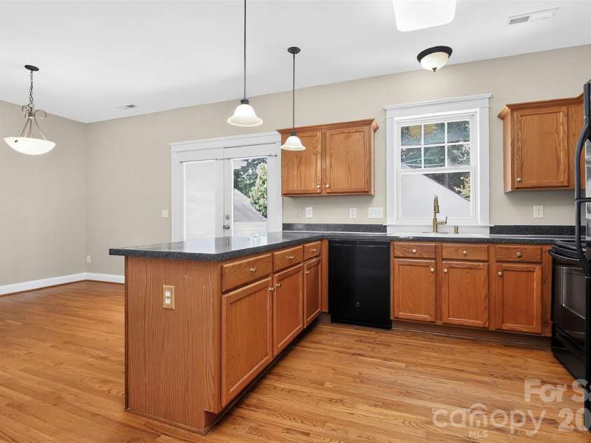 13019 West Douglas Park Drive, Huntersville, NC 28078.  MLS# CAR4395919, YatesRealty ID 31922. Kitchen and Dining Rm