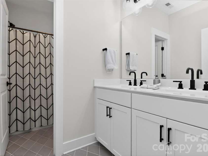 1101 Masefield Avenue, Matthews, NC 28105.  MLS# CAR4364671, YatesRealty ID 31925. Full Bathroom on second floor