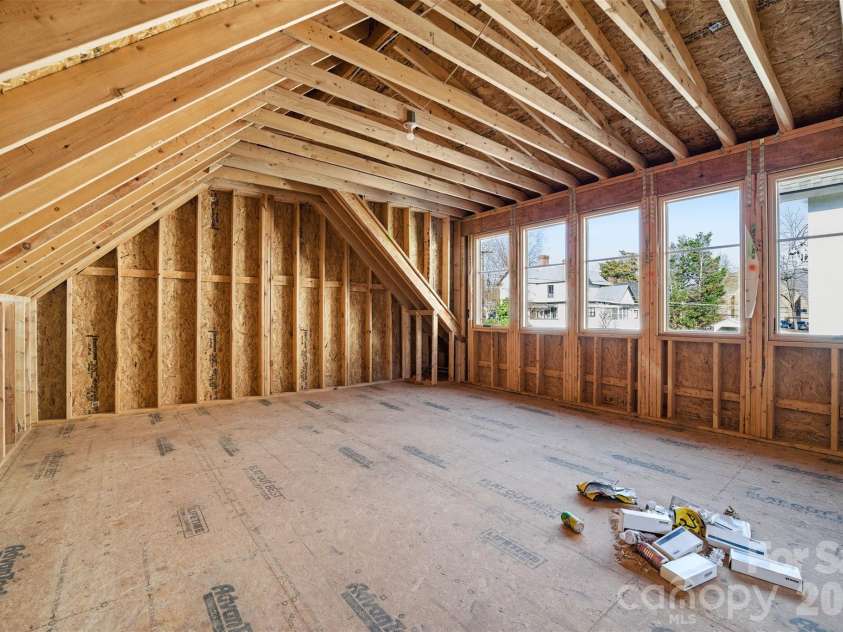 216 Walnut Street, Davidson, NC 28036.  MLS# CAR4300699, YatesRealty ID 31926. Walk up storage with fixed stairs over the garage with potential for additional HLA.
