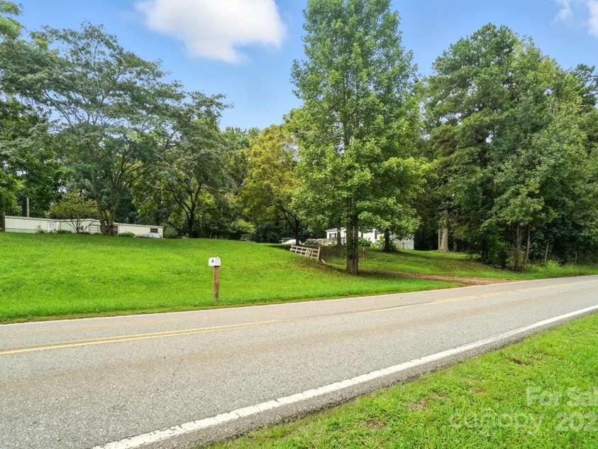 450 Dixon School Road, Kings Mountain, NC 28086.  MLS# CAR4291938, YatesRealty ID 31928. Another view of subject street and view of lot