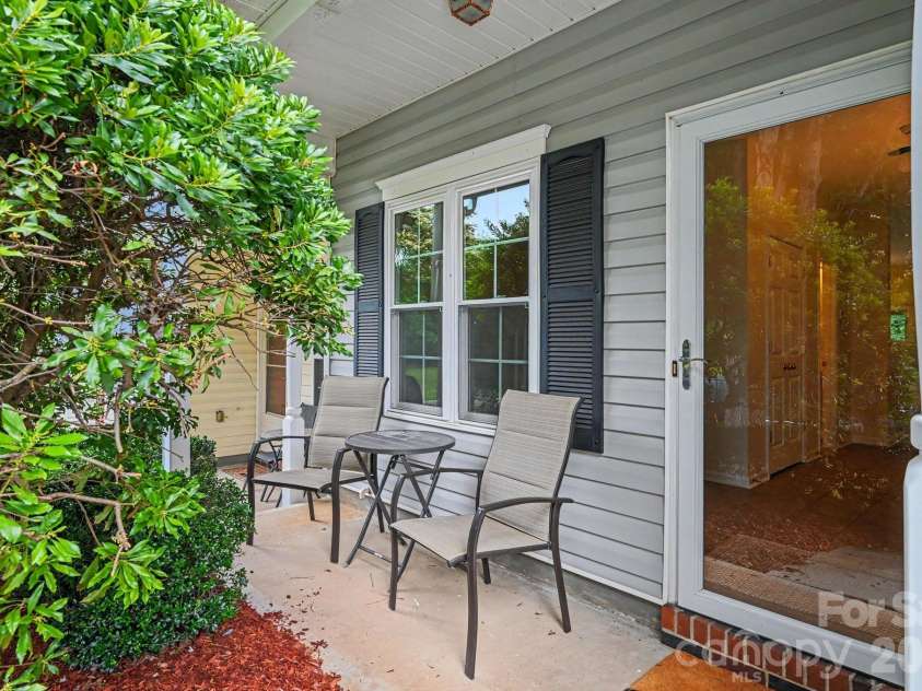 1005 Silver Spring Road, Fort Mill, SC 29715.  MLS# CAR4386266, YatesRealty ID 31947. Front covered patio area