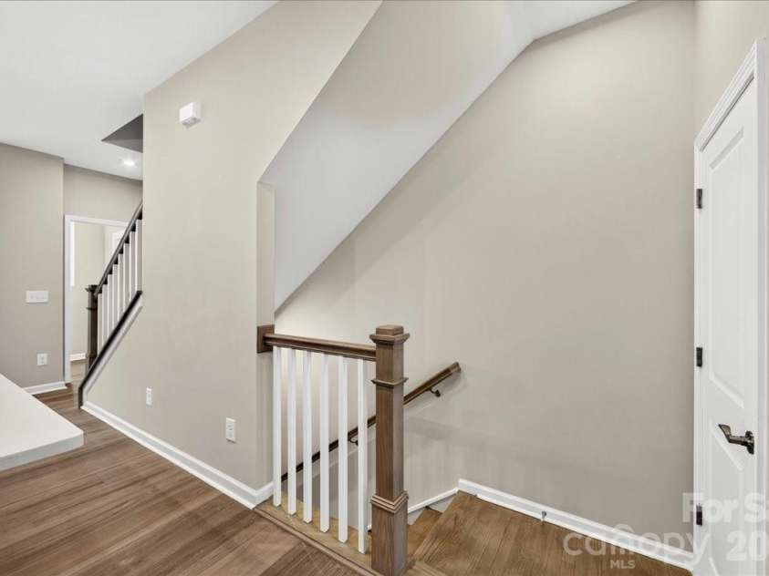 5517 Swaling Street, Charlotte, NC 28217.  MLS# CAR4394092, YatesRealty ID 31950. Second floor landing with open rails