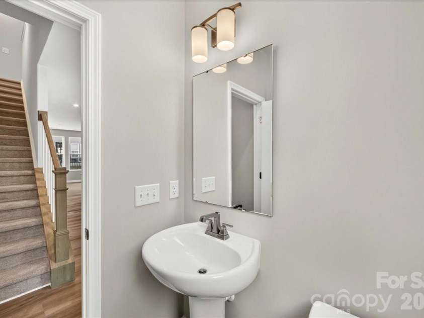 5517 Swaling Street, Charlotte, NC 28217.  MLS# CAR4394092, YatesRealty ID 31950. Second floor powder