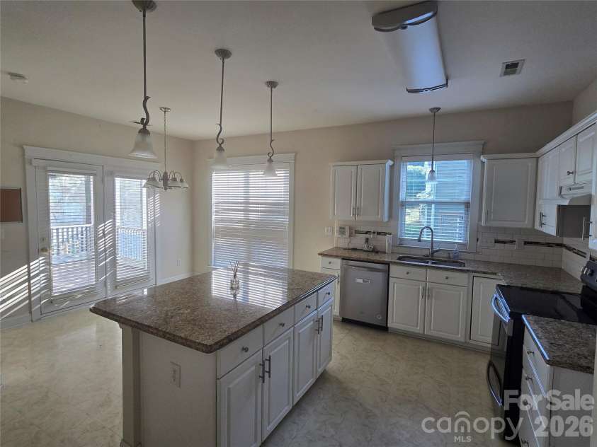 2615 Merion Hills Court, Charlotte, NC 28269.  MLS# CAR4382645, YatesRealty ID 31951. 