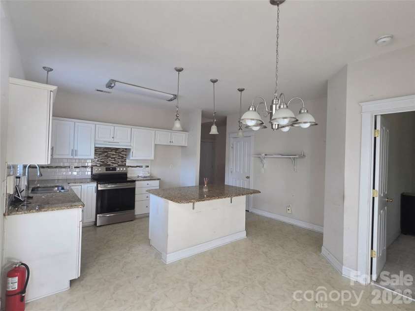 2615 Merion Hills Court, Charlotte, NC 28269.  MLS# CAR4382645, YatesRealty ID 31951. 