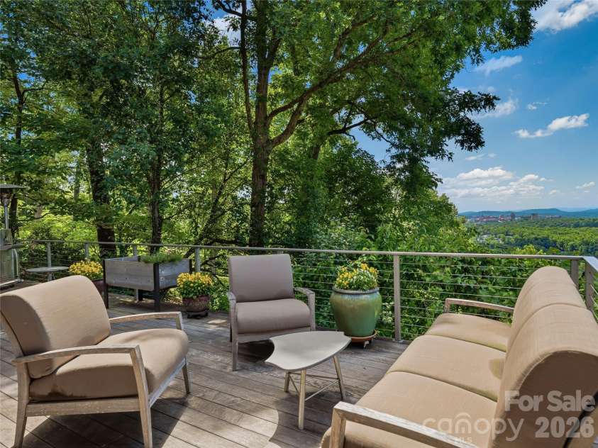 102 Horizon Hill Road, Asheville, NC 28804.  MLS# CAR4355057, YatesRealty ID 31953. Inviting deck