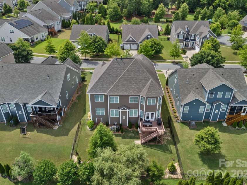 12214 Bonny Oaks Drive, Cornelius, NC 28031.  MLS# CAR4264474, YatesRealty ID 31958. Aerial of rear yard