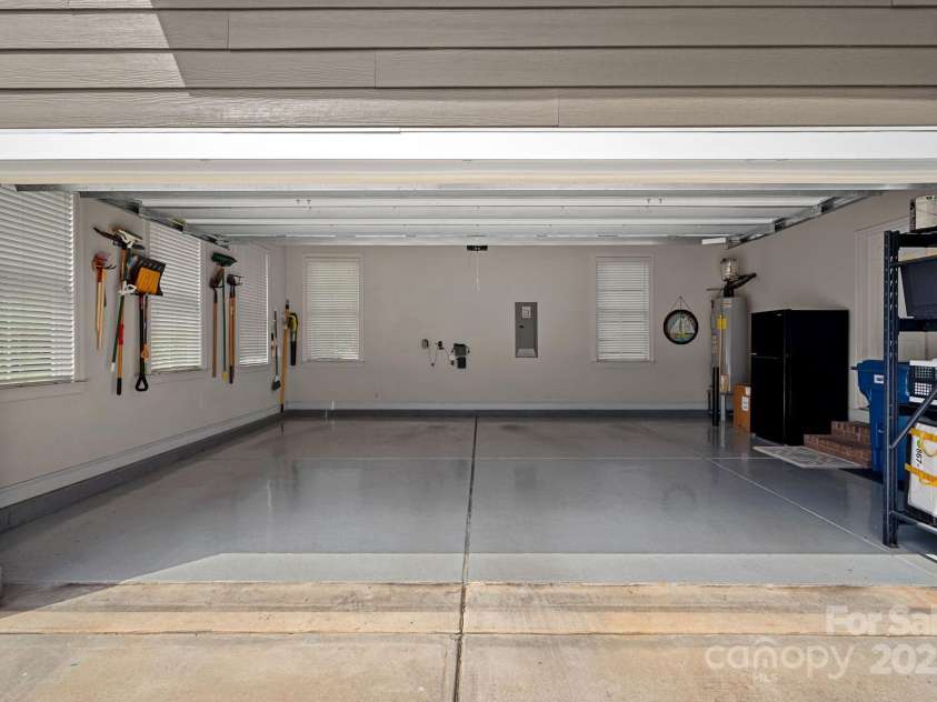 12214 Bonny Oaks Drive, Cornelius, NC 28031.  MLS# CAR4264474, YatesRealty ID 31958. Double garage bay has epoxy flooring and is immaculate.