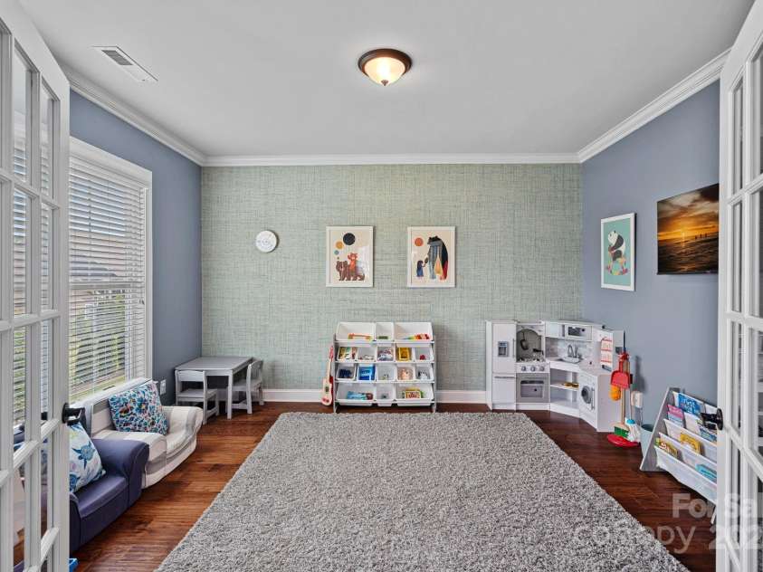 12214 Bonny Oaks Drive, Cornelius, NC 28031.  MLS# CAR4264474, YatesRealty ID 31958. Downstairs Office/ Currently Playroom