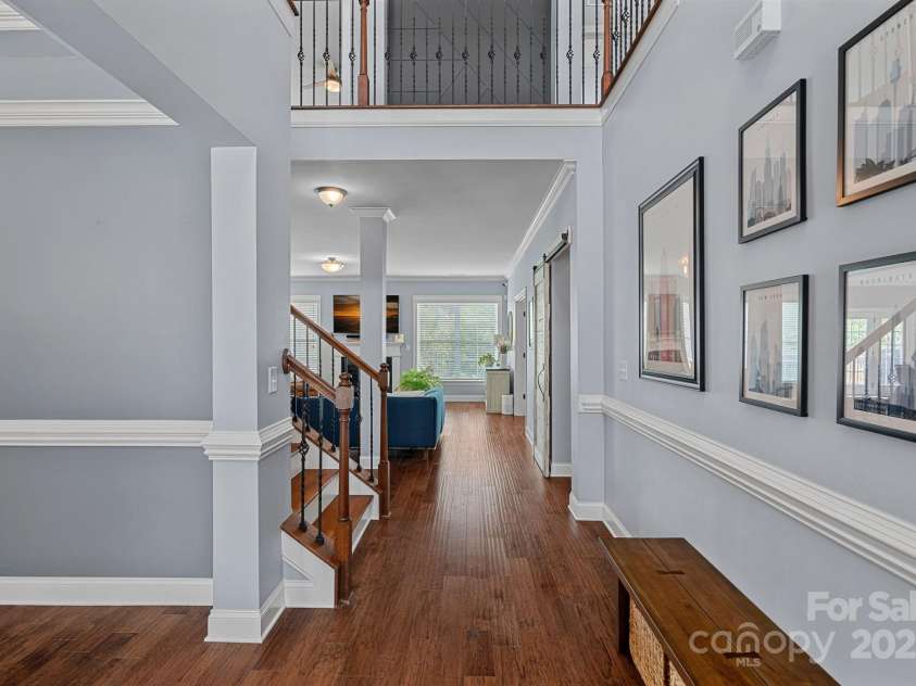 12214 Bonny Oaks Drive, Cornelius, NC 28031.  MLS# CAR4264474, YatesRealty ID 31958. Foyer looking into great room