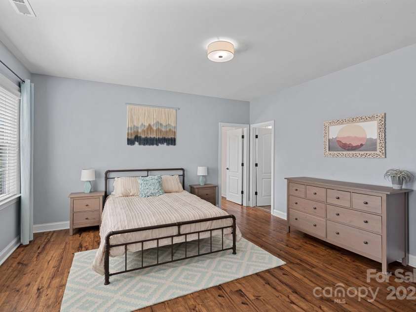 12214 Bonny Oaks Drive, Cornelius, NC 28031.  MLS# CAR4264474, YatesRealty ID 31958. Guest bedroom (bed 2) with large walk in closet and ensuite!
