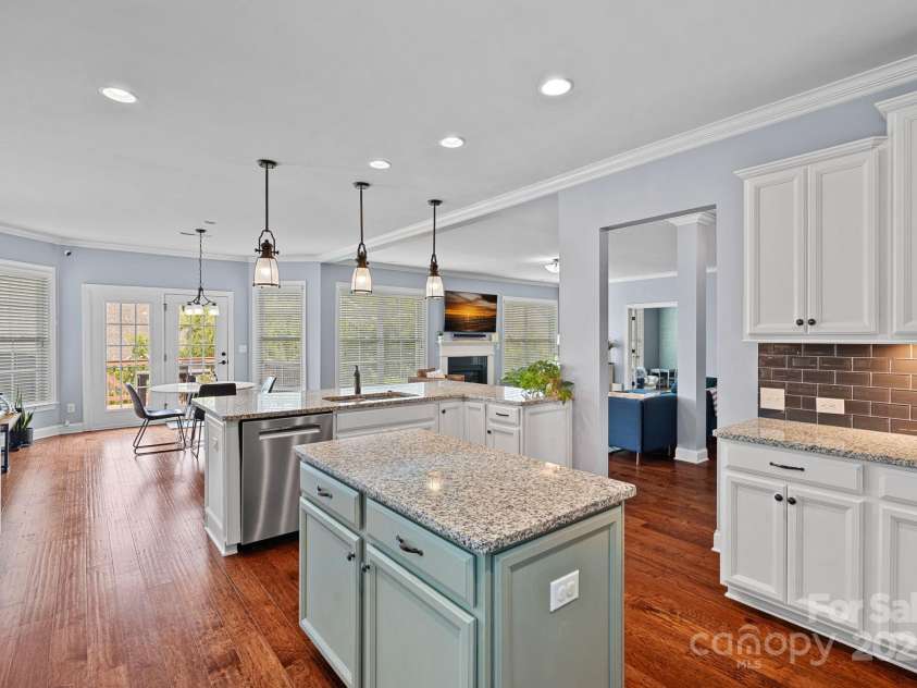 12214 Bonny Oaks Drive, Cornelius, NC 28031.  MLS# CAR4264474, YatesRealty ID 31958. Kitchen boasts stainless steel appliances, quartz counters and tons of prep space!