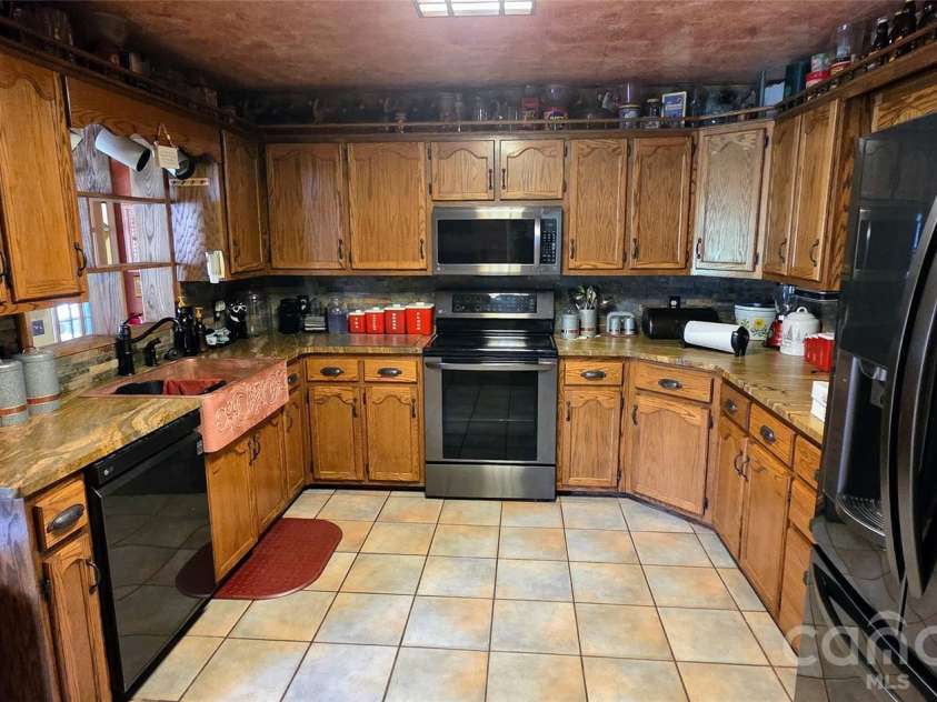 3110 Ninth Tee Drive, Newton, NC 28658.  MLS# CAR4409937, YatesRealty ID 31959. 