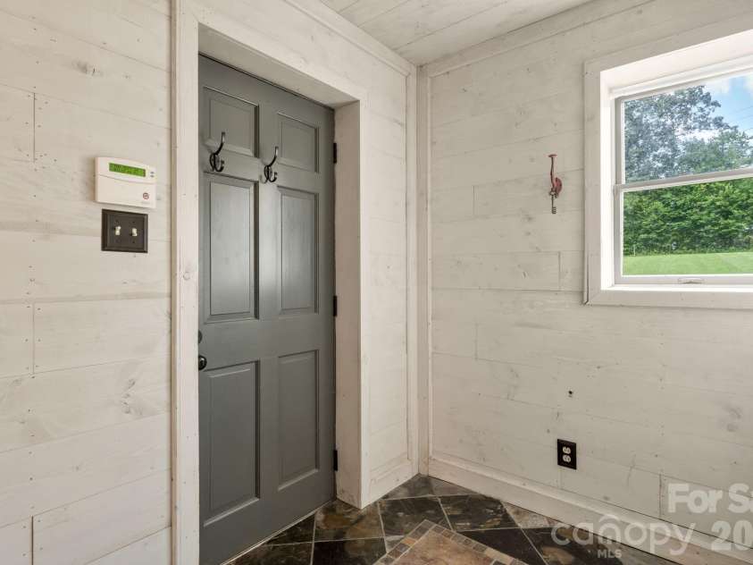 3110 Ninth Tee Drive, Newton, NC 28658.  MLS# CAR4427024, YatesRealty ID 31959. Basement exterior door, could be private entry/exit