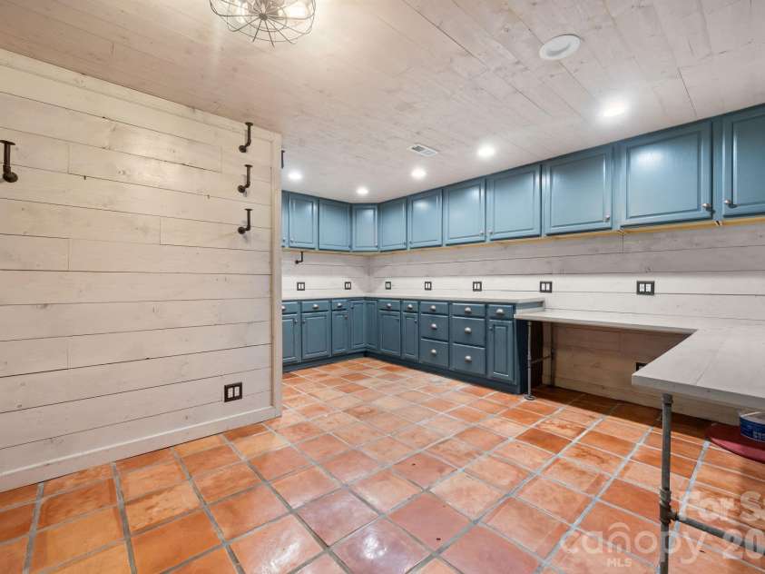 3110 Ninth Tee Drive, Newton, NC 28658.  MLS# CAR4427024, YatesRealty ID 31959. Basement flex area, hobby area, living area