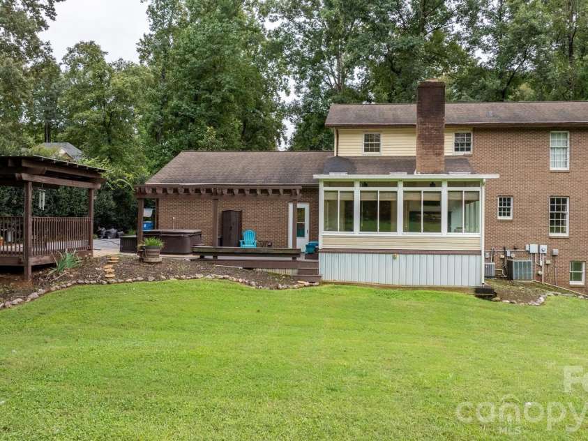 3110 Ninth Tee Drive, Newton, NC 28658.  MLS# CAR4427024, YatesRealty ID 31959. Large flat private backyard