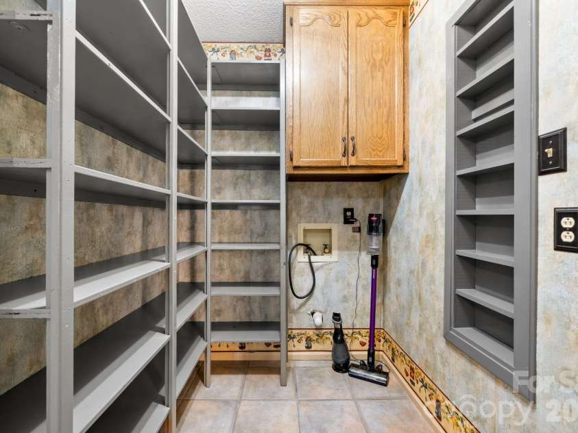 3110 Ninth Tee Drive, Newton, NC 28658.  MLS# CAR4427024, YatesRealty ID 31959. Pantry area off of kitchen