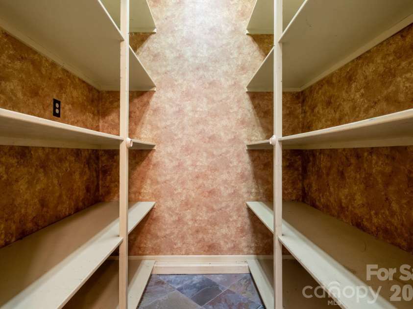 3110 Ninth Tee Drive, Newton, NC 28658.  MLS# CAR4427024, YatesRealty ID 31959. Pantry/storage off of laundry room/mudroom