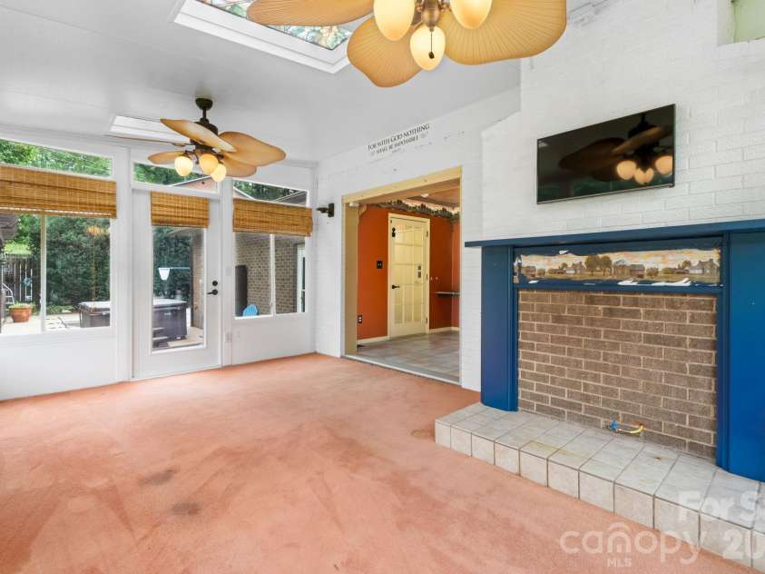 3110 Ninth Tee Drive, Newton, NC 28658.  MLS# CAR4427024, YatesRealty ID 31959. Sunroom leading to outdoor deck
