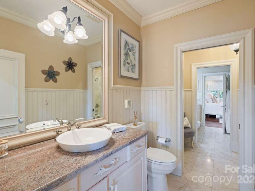 525 Lake Lynn Road, Concord, NC 28025.  MLS# CAR4239397, YatesRealty ID 3196. Ensuite Four with shared tub/shower to guest suite three.