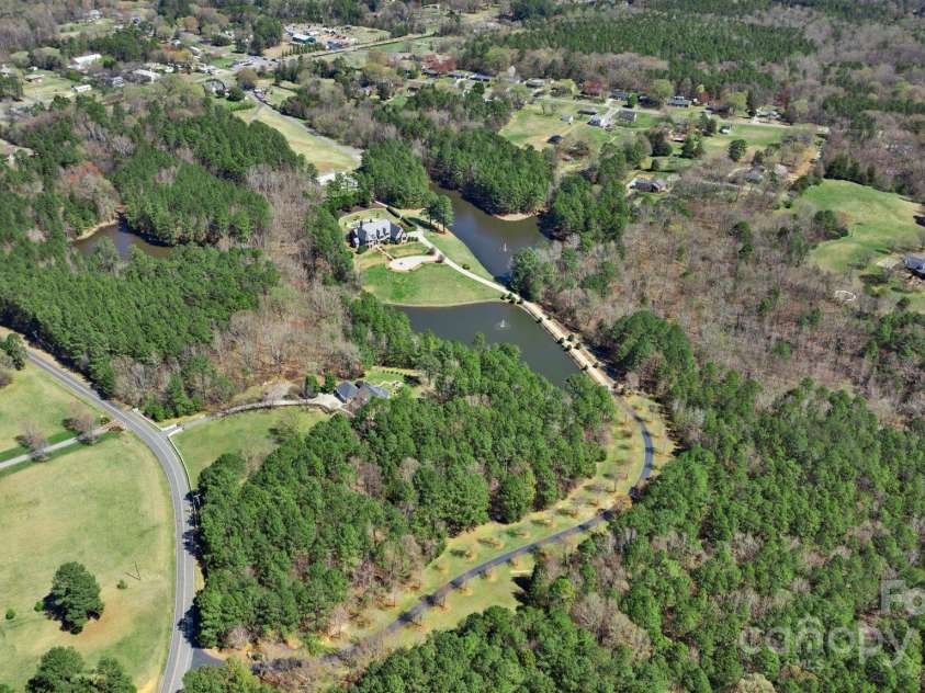 525 Lake Lynn Road, Concord, NC 28025.  MLS# CAR4239397, YatesRealty ID 3196. Zoomed out aerial view of entire 33+ acres