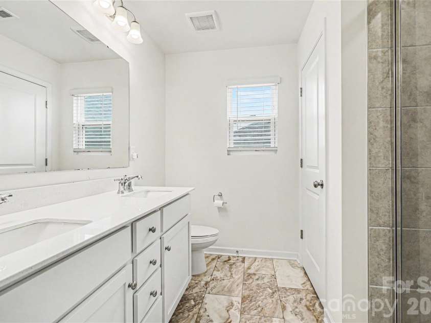5222 Maynard Hill Drive, Monroe, NC 28110.  MLS# CAR4386034, YatesRealty ID 31971. Primary bath