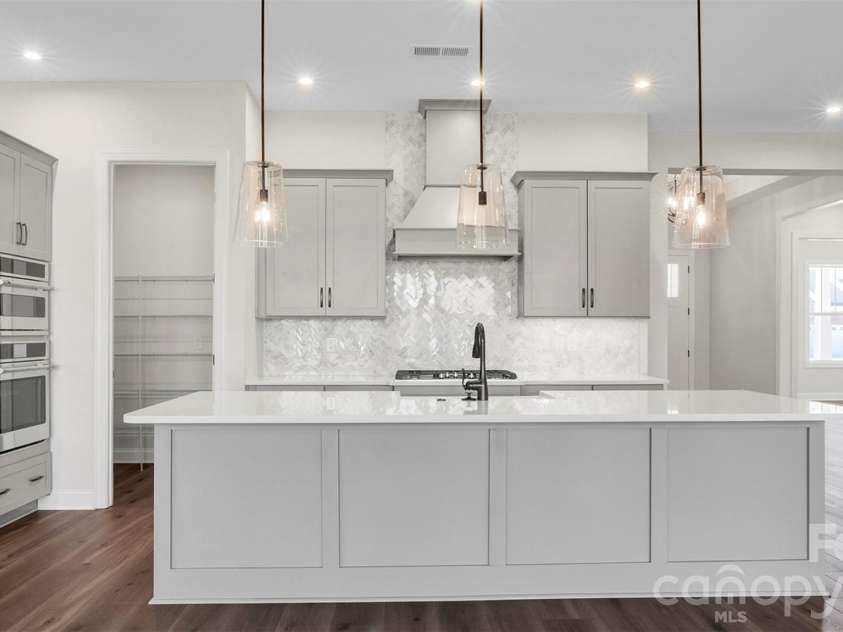 3026 Brush Creek, Monroe, NC 28110.  MLS# CAR4377340, YatesRealty ID 31975. Kitchen Island 