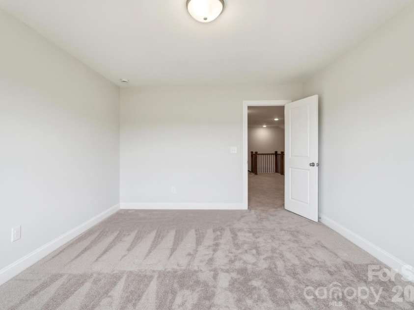 10806 Coble Road, Charlotte, NC 28227.  MLS# CAR4359421, YatesRealty ID 31977. Upper level bedroom