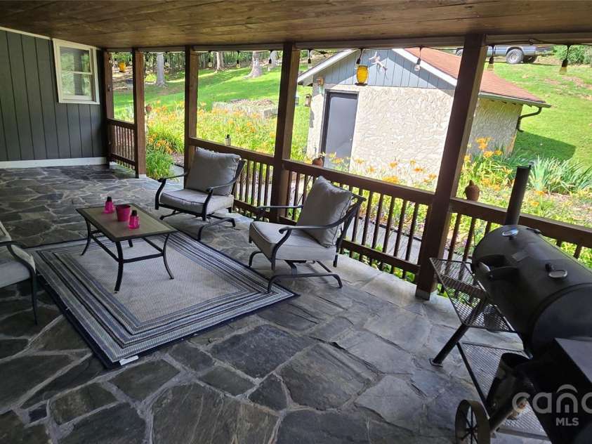 414 Pine Cove Road, Old Fort, NC 28762.  MLS# CAR4276158, YatesRealty ID 31977. Covered porch