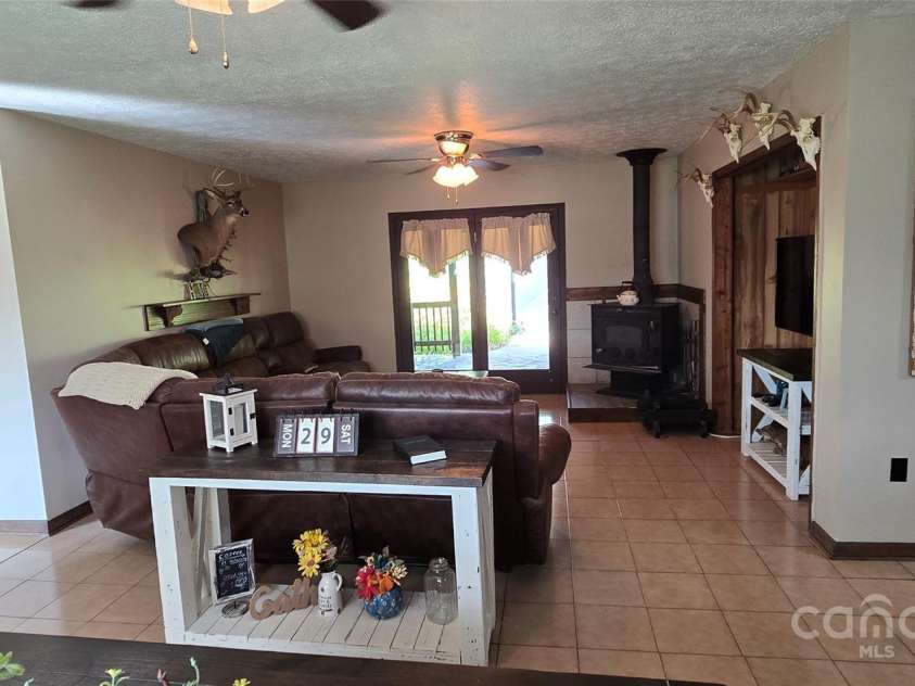 414 Pine Cove Road, Old Fort, NC 28762.  MLS# CAR4276158, YatesRealty ID 31977. From dining area