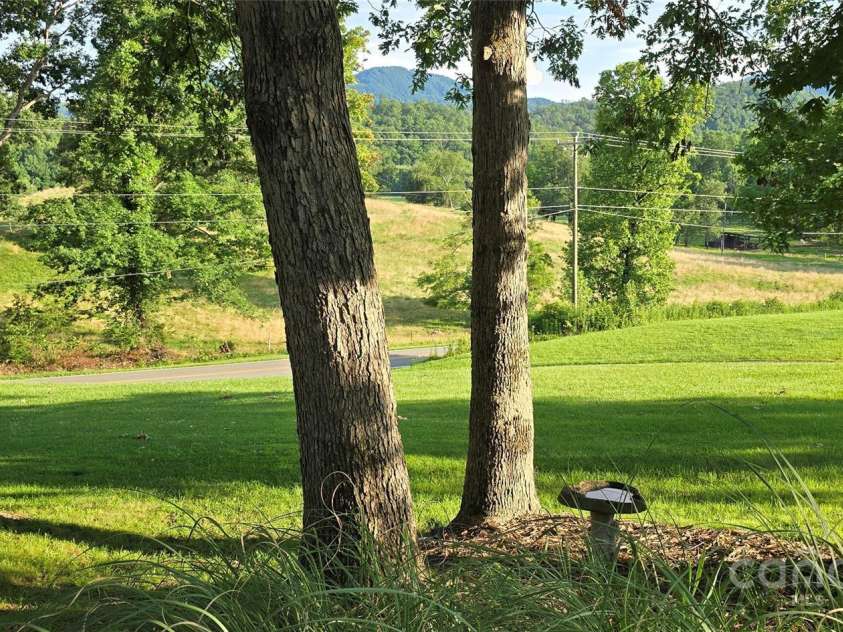 414 Pine Cove Road, Old Fort, NC 28762.  MLS# CAR4276158, YatesRealty ID 31977. Front hill