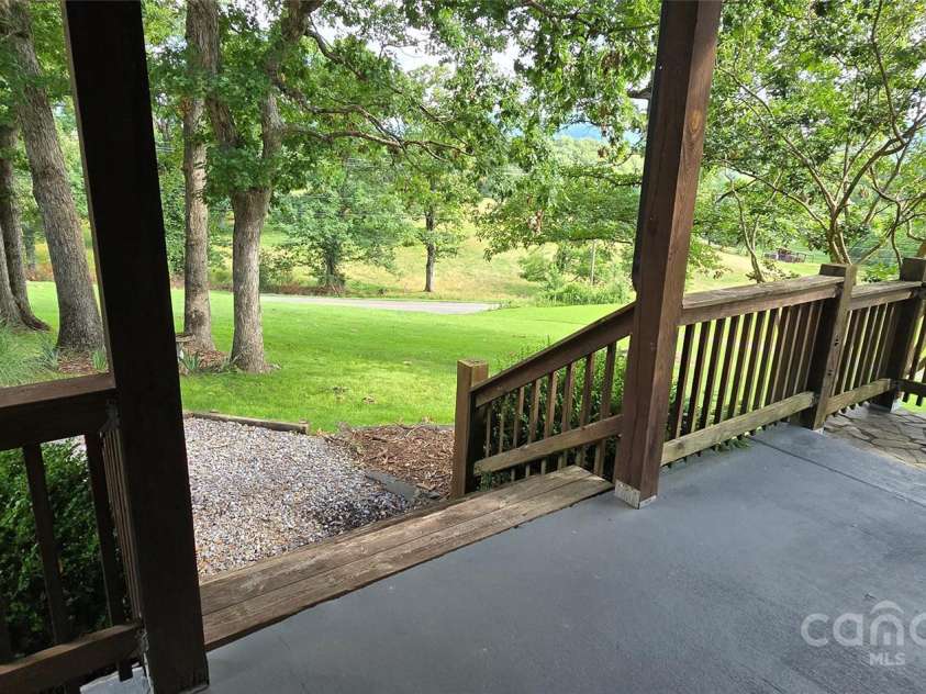 414 Pine Cove Road, Old Fort, NC 28762.  MLS# CAR4276158, YatesRealty ID 31977. Front porch