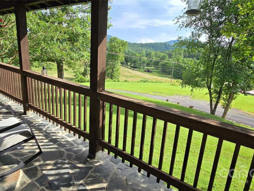 414 Pine Cove Road, Old Fort, NC 28762.  MLS# CAR4276158, YatesRealty ID 31977. Left porch