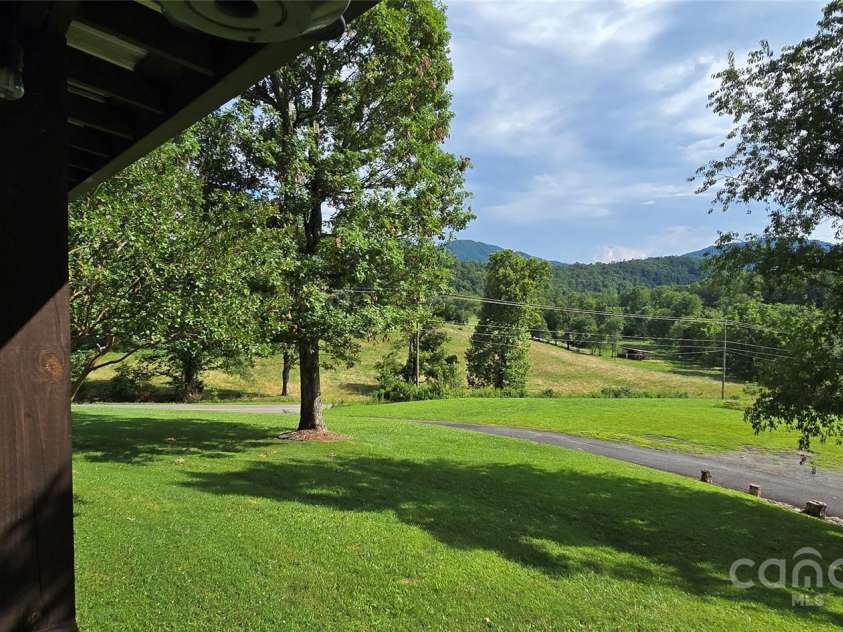 414 Pine Cove Road, Old Fort, NC 28762.  MLS# CAR4276158, YatesRealty ID 31977. Left porch