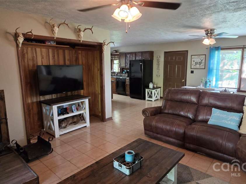 414 Pine Cove Road, Old Fort, NC 28762.  MLS# CAR4276158, YatesRealty ID 31977. Livingroom